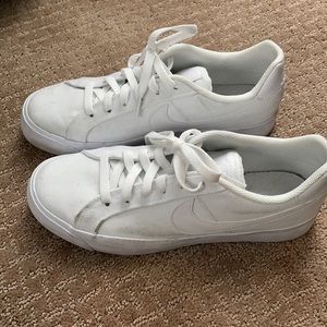 Women’s white canvas Nike sneakers
